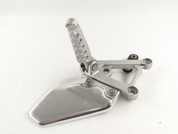 Aprilia RSV 1000 Tuono RP [2005] - Footrest holder and footrest left - 0